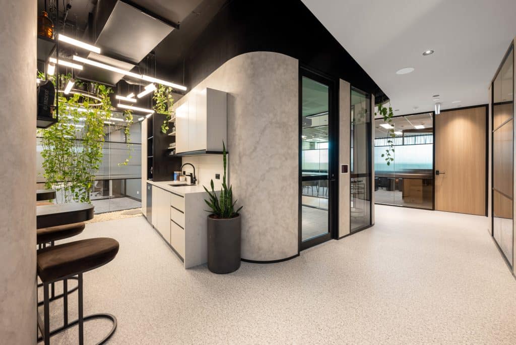a beautiful coworking space with a sink