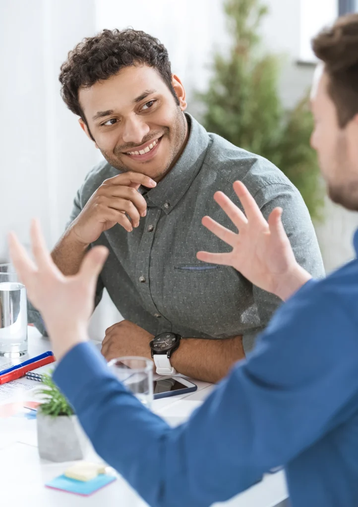 Person making a good first impression talking to client